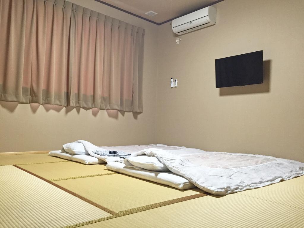 Onsenminshuku Kosakaya Hotel Nachikatsuura Buitenkant foto